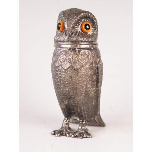 756 - A Silver Plated Pepper in the form of an owl with glass eyes