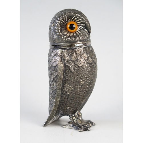 756 - A Silver Plated Pepper in the form of an owl with glass eyes