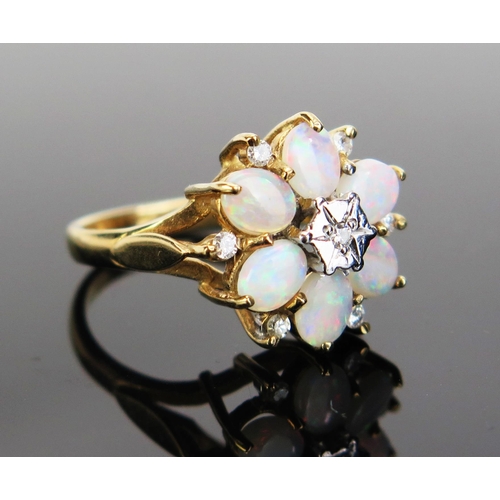 80 - A 9ct Gold, Opal and Diamond Cluster Ring, 16mm head, hallmarked, 4.17g