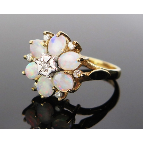 80 - A 9ct Gold, Opal and Diamond Cluster Ring, 16mm head, hallmarked, 4.17g