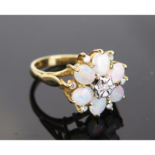 80 - A 9ct Gold, Opal and Diamond Cluster Ring, 16mm head, hallmarked, 4.17g