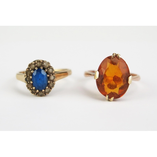 83 - A 9ct Gold and Citrine? Ring, stamped 9CT, 13x10mm stone, size L.5, 3.08g and one other 2.32g