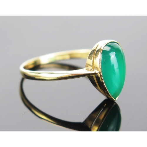 95 - An 18ct Gold and Green Agate Ring, millegrain set teardrop shape, stamped 18CT, size Q.5, 2.3g