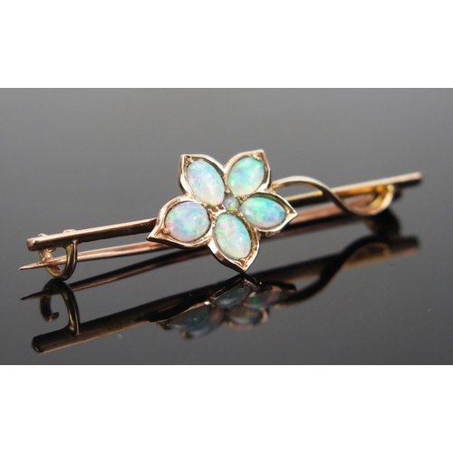 99 - An Opal Foliate Brooch in an unmarked precious yellow metal setting, KEE tested as 18ct, 43mm, 2.32g