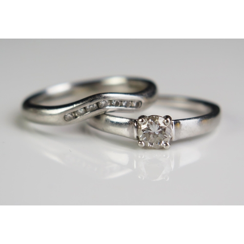 116 - A Beaverbrooks .950 Platinum and Diamond Engagement and Wedding Ring Set comprising a solitaire with... 