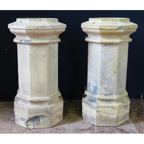 1361A - A Pair of Chimney Pots, 64cm high. One with loss to the base