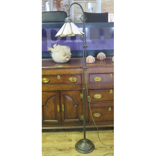 1417 - A bronzed metal adjustable standard lamp in the Victorian style with hinged petal-shaped shade, 140c... 