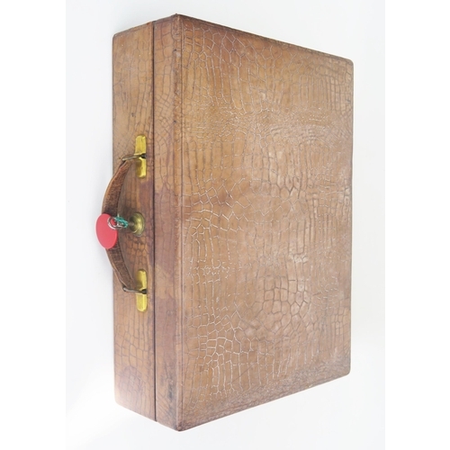 294 - A Crocodile Skin Jewellery Case with Bramah lock and single lift out tray, 36x26x10cm