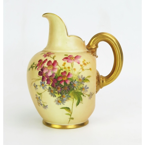 1011 - A Royal Worcester blush ivory cream jug, with painted floral spray decoration heightened in gilt, wi... 