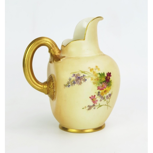 1011 - A Royal Worcester blush ivory cream jug, with painted floral spray decoration heightened in gilt, wi... 