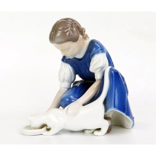 1015 - A B&G Copenhagen porcelain figure No 1745, girl feeding a cat, 14cm high.