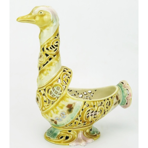 1016 - A Zsolnay Pecs pottery model of a bird, with pierced spiral decoration to the neck and body with pai... 