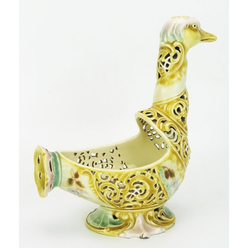 1016 - A Zsolnay Pecs pottery model of a bird, with pierced spiral decoration to the neck and body with pai... 