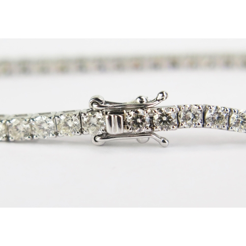 102 - An 18ct White Gold and Diamond Tennis or Line Bracelet, stamped 18K, 5.11ct of diamonds, 7