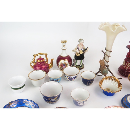 1023 - A collection of  assorted ceramics including Limoges miniature plates, cabinet vases, boxes and cove... 