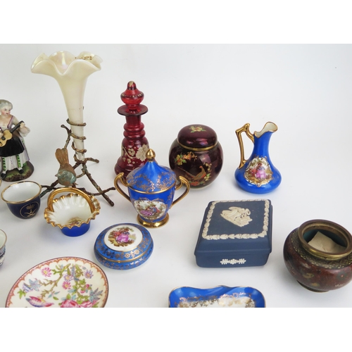 1023 - A collection of  assorted ceramics including Limoges miniature plates, cabinet vases, boxes and cove... 