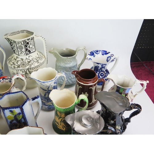 1024 - A collection of assorted Victorian and later jugs, including moulded cordial jugs, milk and water ju... 