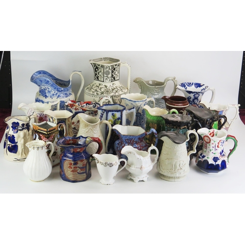 1024 - A collection of assorted Victorian and later jugs, including moulded cordial jugs, milk and water ju... 