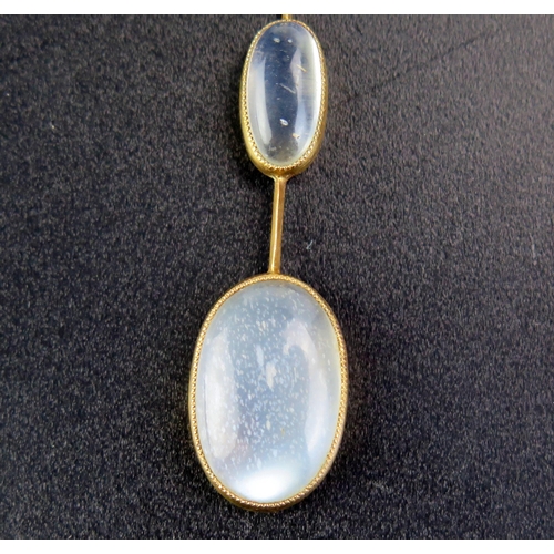 104 - An Antique Large 9ct Gold and Moonstone Necklace with integral chain, panel stamped 9CT, overall len... 