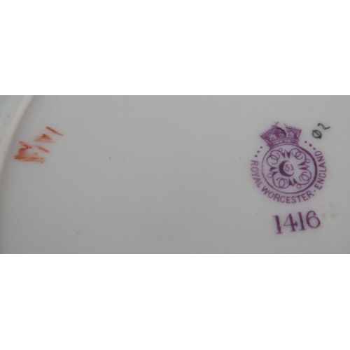 1048 - A Royal Worcester blush ivory cabinet plate, pattern 1416, puce marks 1898, 21cm diameter.