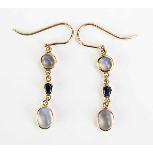 105 - A Pair of Moonstone and Sapphire Earrings in precious yellow metal settings, KEE tested a 9ct, 40mm ... 