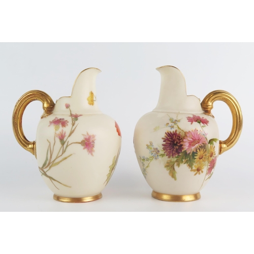 1050 - Two Royal Worcester blush ivory cream jugs with 1094 painted summer flowers decoration, puce marks, ... 