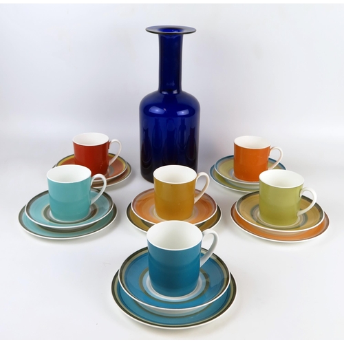 1061 - A Susie Cooper six setting tea service with cups, saucers and side plates, together with a large blu... 