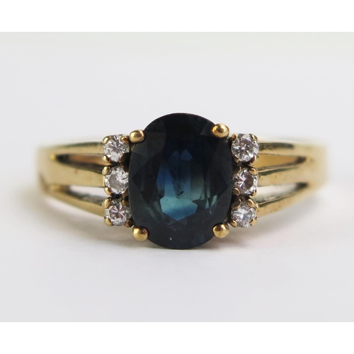 107 - A 9ct Gold, Sapphire and Diamond Ring, 8.5x6.5mm principal stone, hallmarked, size Q.5, 3.75g gross