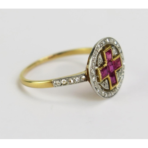 109 - A Ruby and Diamond Ring in a precious yellow metal setting, the five princess cut rubies set as a cr... 