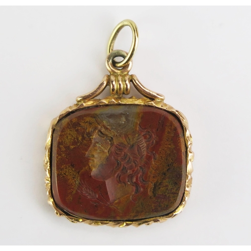 110 - A Specimen Stone Intaglio Fob in Yellow Precious Metal Setting, decorated with a bust in profile, (2... 