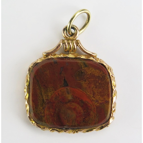 110 - A Specimen Stone Intaglio Fob in Yellow Precious Metal Setting, decorated with a bust in profile, (2... 