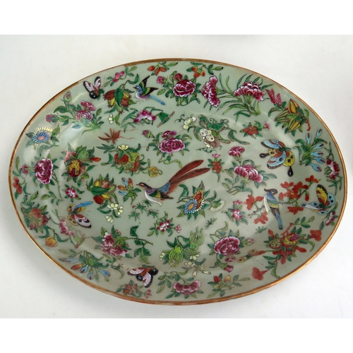 1100 - A late 19th century famille verte oval dish decorated with birds amongst flowers, together with a lo... 