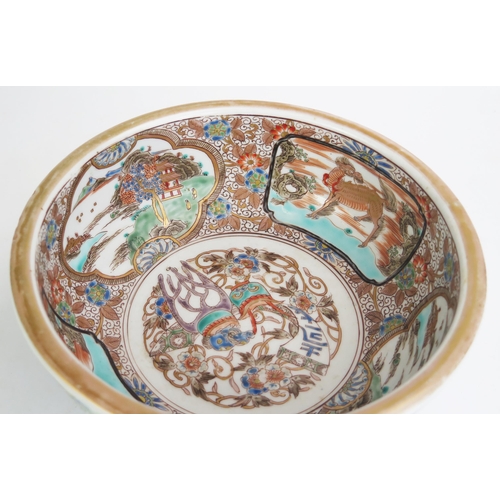 1106 - A 19th century Japanese famille verte bowl, the interior decorated with cartouches of landscapes and... 