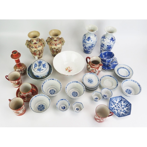 1107 - A collection of assorted Chinese and Japanese ceramics, including blue and white rice bowls and cove... 