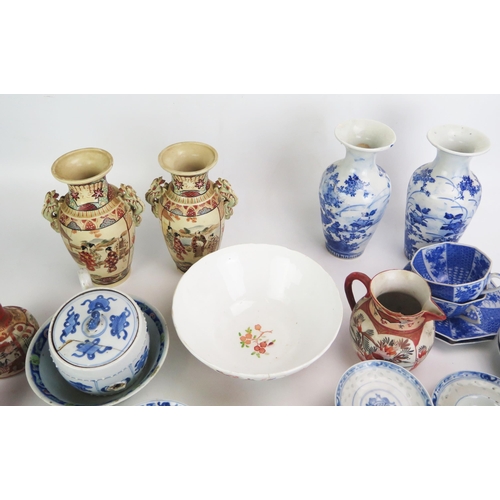 1107 - A collection of assorted Chinese and Japanese ceramics, including blue and white rice bowls and cove... 