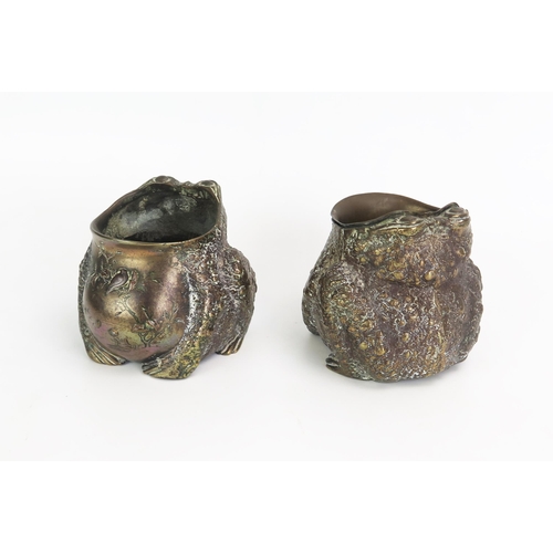 1109 - A pair of Japanese bronze vases in the form of toads with gaping mouths, one with a liner, 10cm high