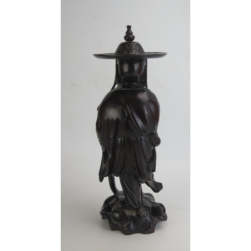 1124 - A Chinese root wood carving of an immortal possibly Lu Tung-pin, 41cm high.