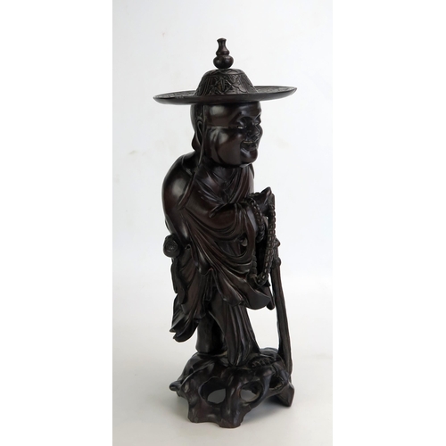 1124 - A Chinese root wood carving of an immortal possibly Lu Tung-pin, 41cm high.