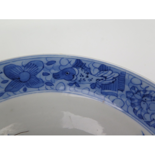 1131 - A pair of 19th century Chinese blue and white 'Lantern Festival' pattern plates, 21.5cm diameter tog... 