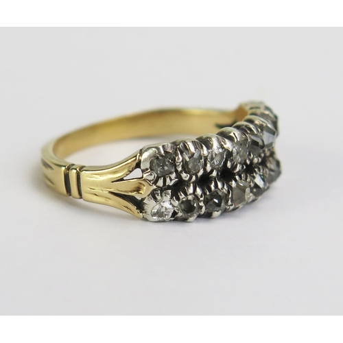 114 - A Georgian Double Row Diamond Ring in a precious yellow metal setting, old cut stones, KEE tested as... 