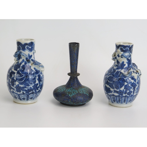 1146 - A pair of Chinese blue and white miniature vases, with applied dragon decoration, 9cm high, together... 