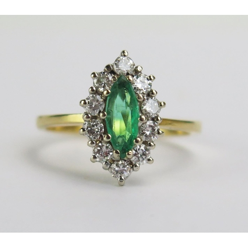 116 - An 18ct Gold Emerald and Diamond Marquis Ring, 14x9mm head, hallmarked,  size L.5, 3.26g gross