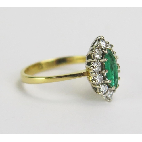 116 - An 18ct Gold Emerald and Diamond Marquis Ring, 14x9mm head, hallmarked,  size L.5, 3.26g gross