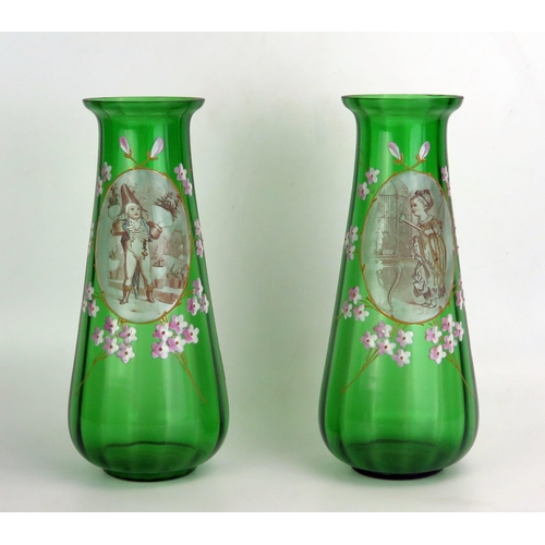 1162 - A pair of Victorian continental green glass vases of tapering form with oval vignettes within floral... 