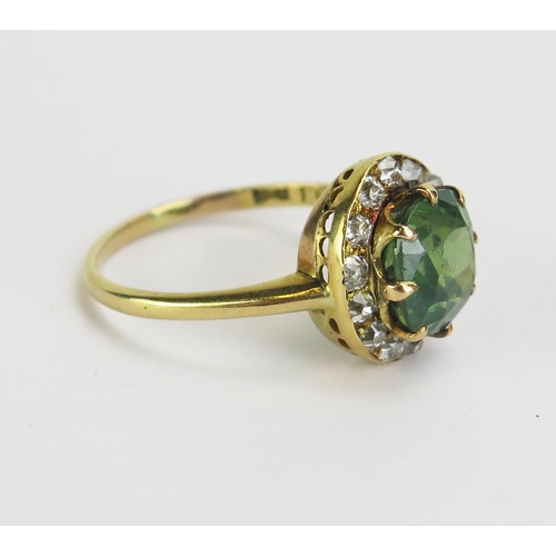 120 - An 18ct Gold, Green Zircon? and Diamond Ring, 9.5x8.5mm principal stone, size S.75, 4.91g gross