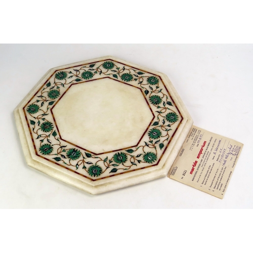 1203 - An Indian marble and pietra dura inlaid octagonal panel, with banded floral decoration, with a mould... 