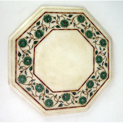 1203 - An Indian marble and pietra dura inlaid octagonal panel, with banded floral decoration, with a mould... 