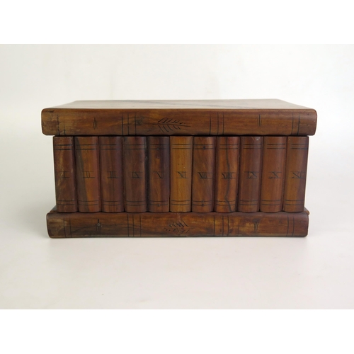 1204 - A treen jewellery box with parquetry banded decoration in the form of books, 23cm wide.