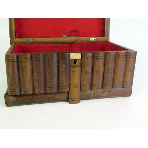 1204 - A treen jewellery box with parquetry banded decoration in the form of books, 23cm wide.