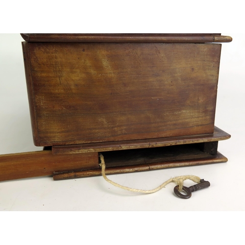 1204 - A treen jewellery box with parquetry banded decoration in the form of books, 23cm wide.